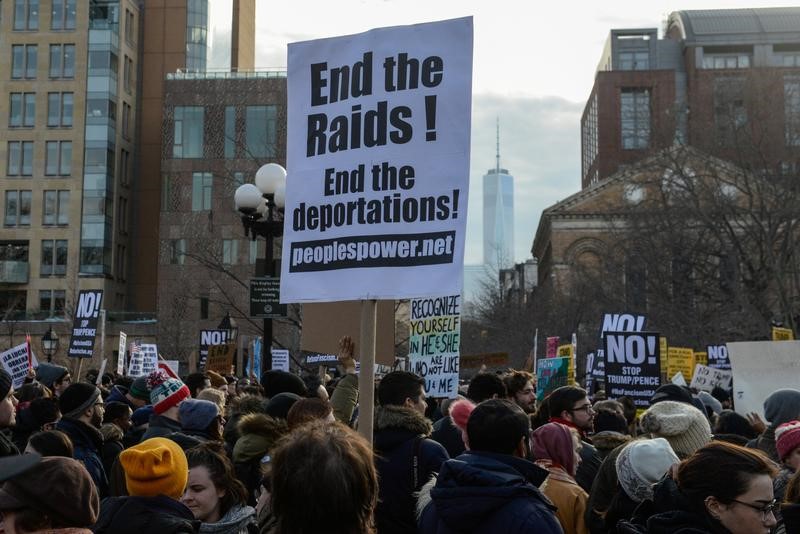 trump says he will unveil new immigration order next week