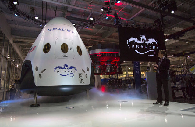 spacex to send first tourists around moon next year