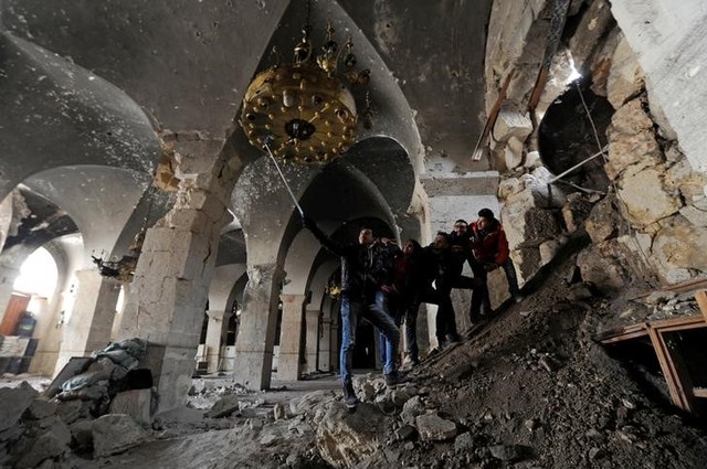 in the rubble  aleppo s citizens work to save damaged heritage