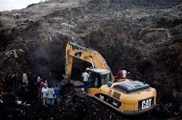at least 65 dead in ethiopian garbage dump landslide