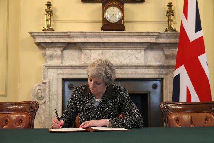 uk pm theresa may signs letter to trigger brexit