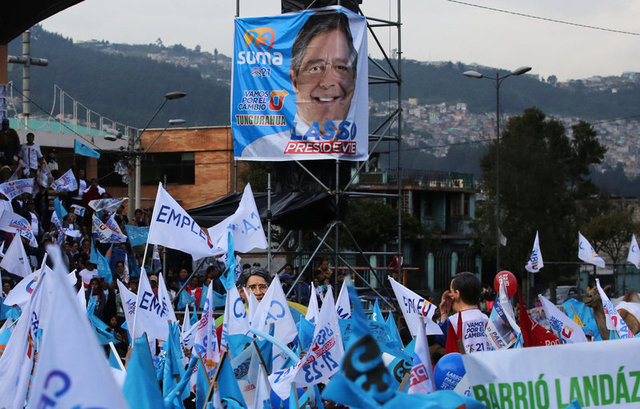 right wing ex banker battles correa ally for ecuador presidency