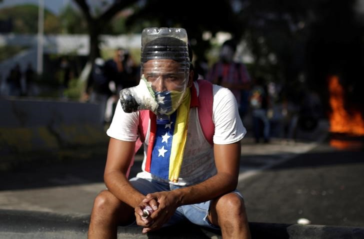 death toll in venezuela s political unrest rises to 26