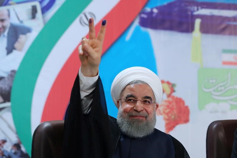 iran s president rouhani defends his economic record ahead of may election