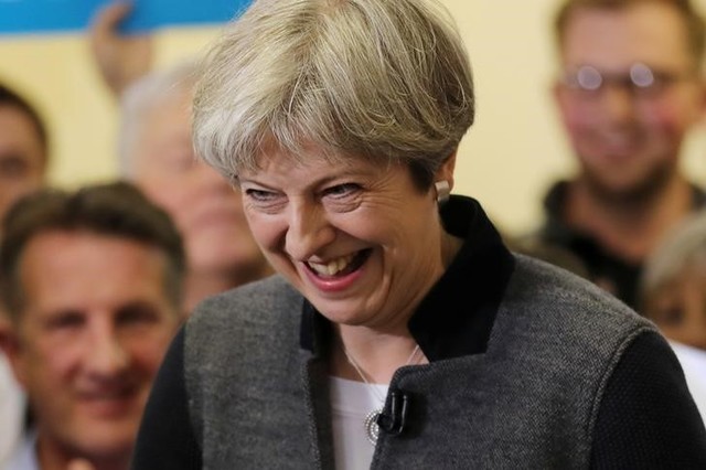 theresa may s conservatives set to sweep uk polls