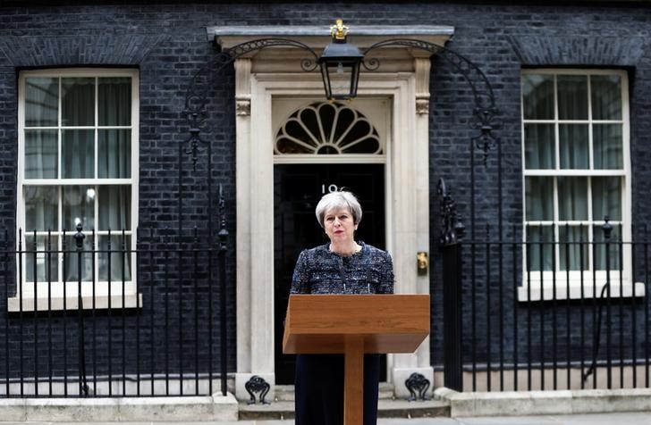 pm may accuses eu of trying to influence elections over brexit