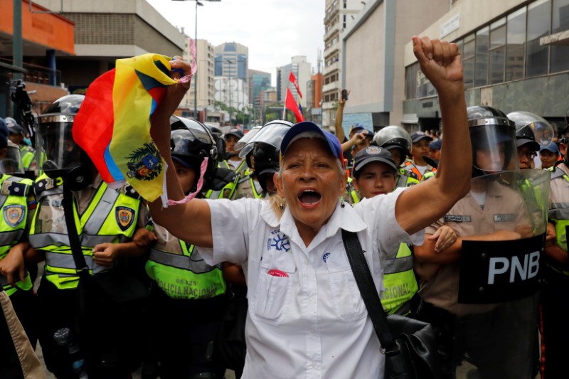 elderly clash with police in venezuela protests