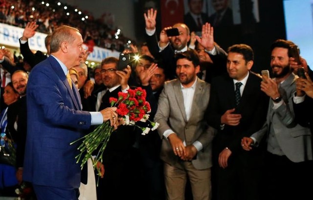 turkey s erdogan vows fight against enemies as he returns to lead party