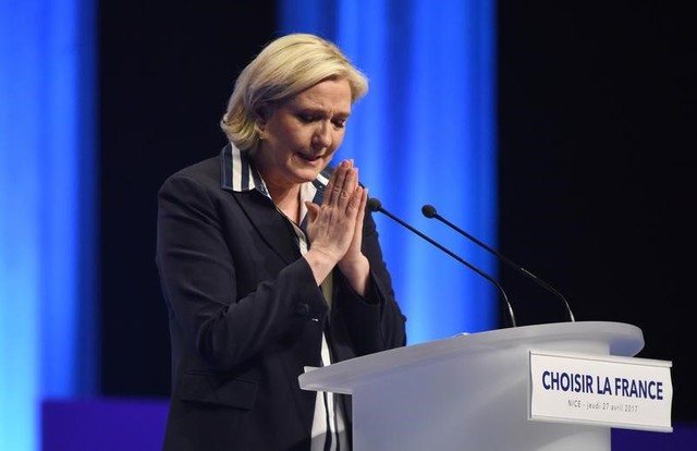 staring at defeat  france s le pen goes back and forth on euro