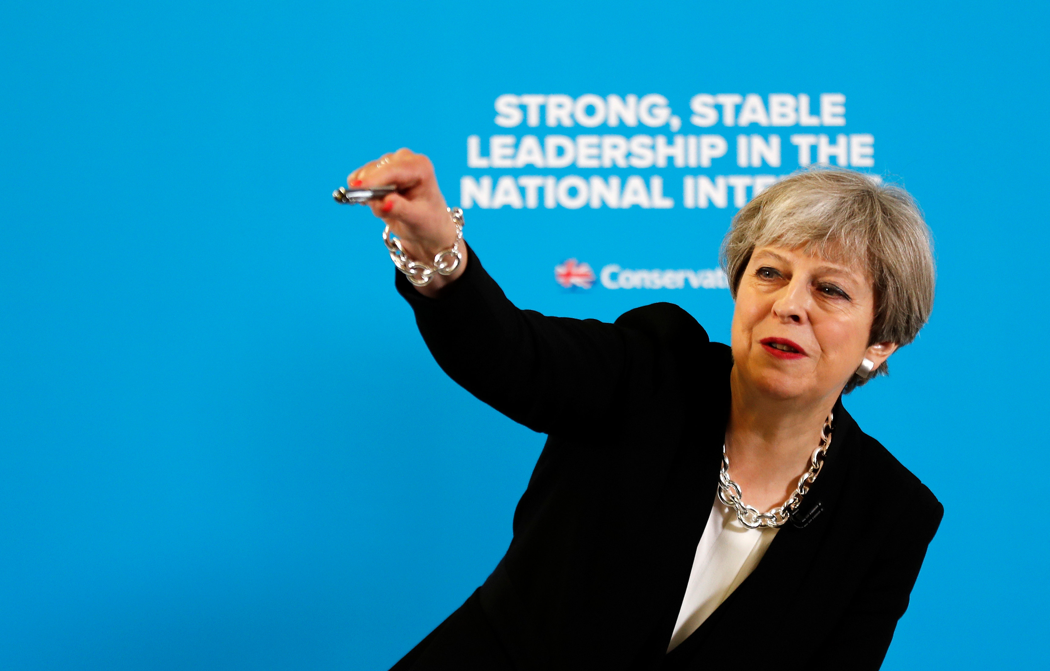 theresa may to pitch market intervention  welfare cuts  looser fiscal policy to voters