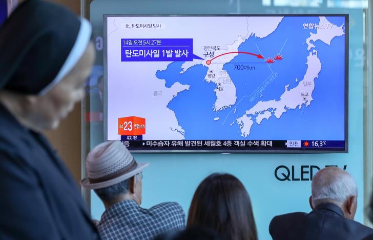 days after south korean leader promises dialogue  north korea test fires new missile