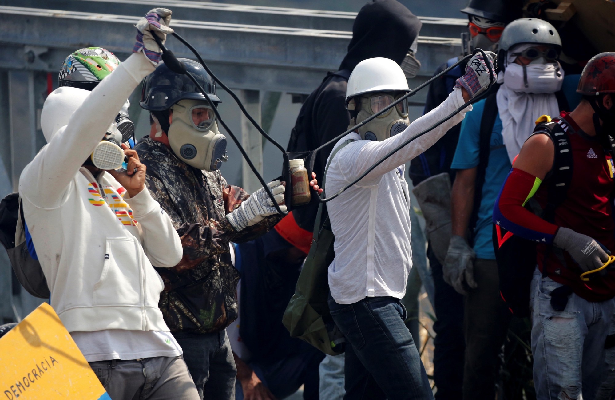venezuela  protesters lob faeces at soldiers as violence kills two more