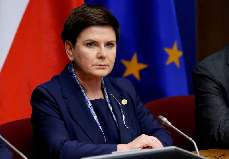 polish pm szydlo under fire for anti migrant comments at auschwitz