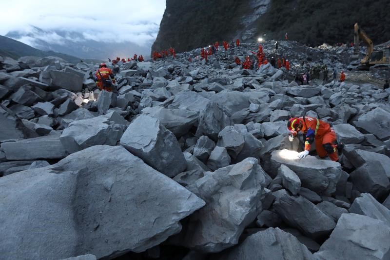 24 dead and over 100 missing in china landslide