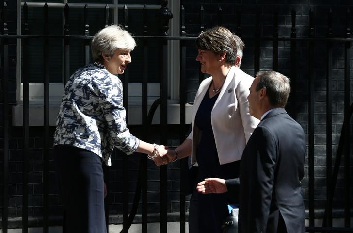 uk pm may strikes  1 3 billion deal for support from northern irish party