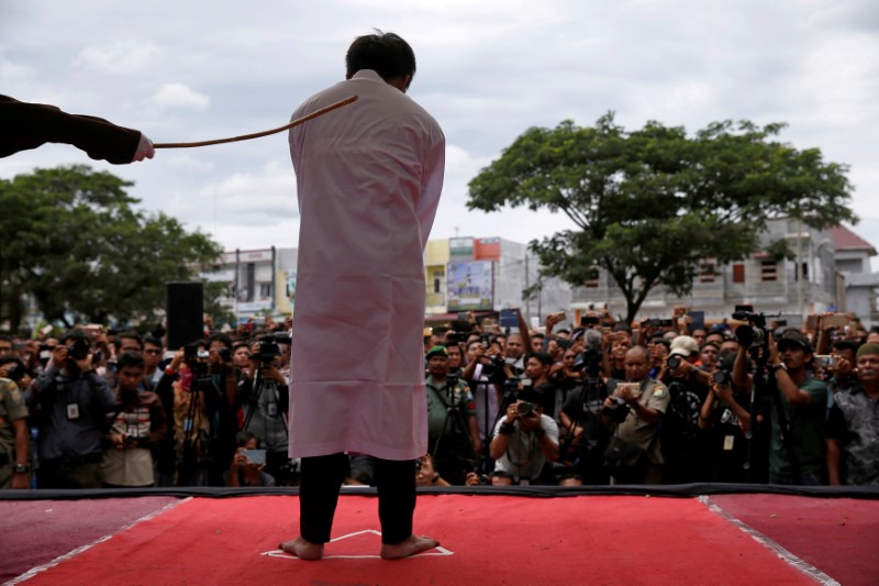 police raids drive indonesia s gay community underground