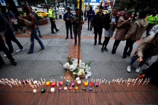 colombians leave floral tributes for victims of bogota blast