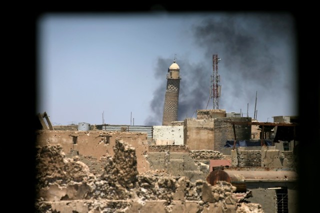 isis bombs historic iraq mosque where it declared a  caliphate 