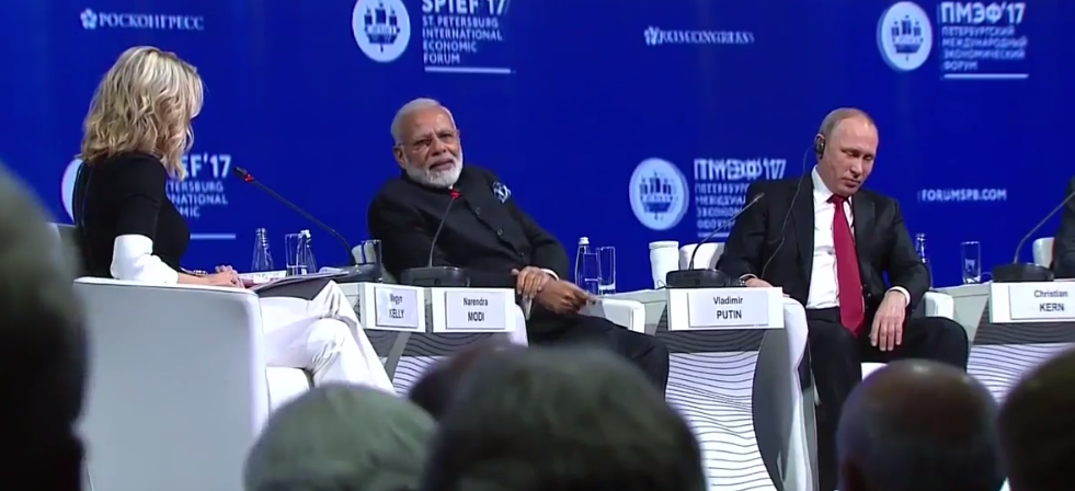 at st petersburg modi and putin field questions on election hacking climate change and terrorism