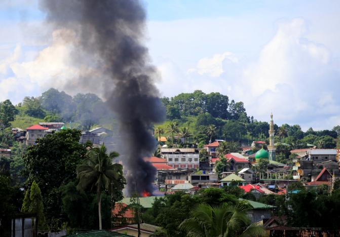 isis militants cling to 20  of philippines town after three week siege