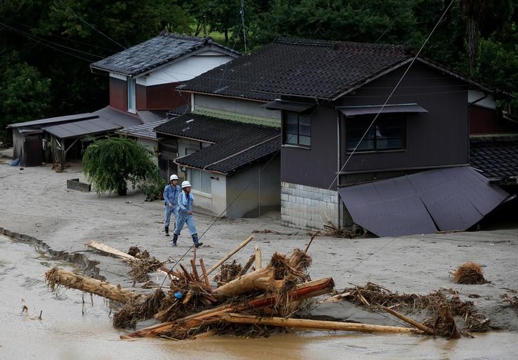 japan  rescuers continue search as more rain forecast  at least 18 dead