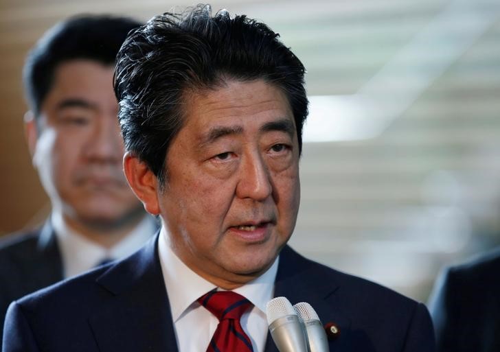 japan pm abe to reshuffle cabinet in bid to shore up support