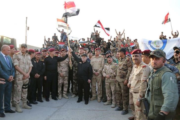 iraqi pm announces victory over isis in mosul