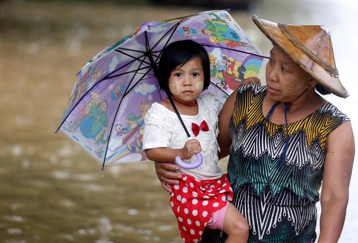 two dead  thousands displaced in myanmar floods