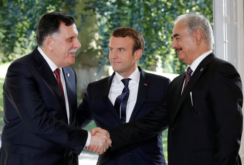 libya leaders handshake on paris peace deal covers up deep fractures
