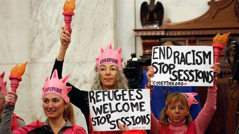 woman convicted for laughing at jeff sessions gets retrial