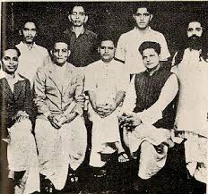 Group photo of Hindu Mahasabha. Standing - Shankar Kistaiya, Gopal Godse, Madanlal Pahwa, Digambar Badge. Seated - Narayan Apte, Vinayak D. Savarkar, Nathuram Godse, Vishnu Karkare. Credit: Flickr