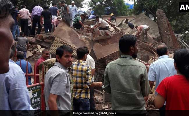 mumbai building collapse  at least twelve killed  many remain trapped