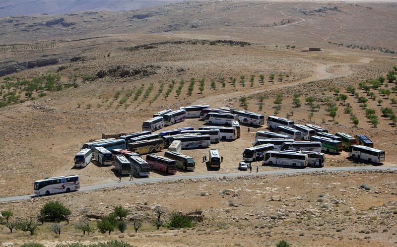 syrians evacuate lebanese border camps  sent back to rebel held syria