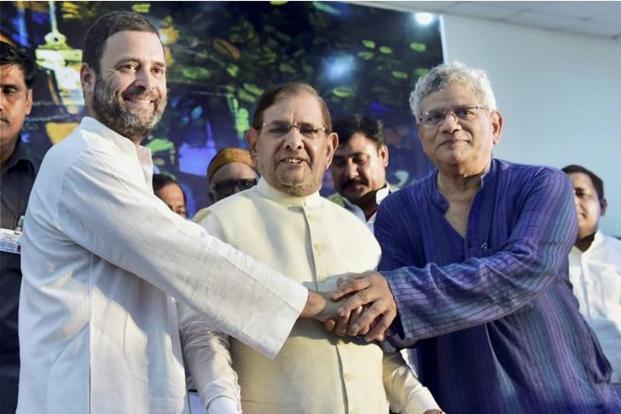 (From left to right) Congress vice president Rahul Gandhi, JDU leader Sharad Yadav and CPM’s Sitaram Yechury at the opposition parties meeting in New Delhi on Thursday. Photo: PTI