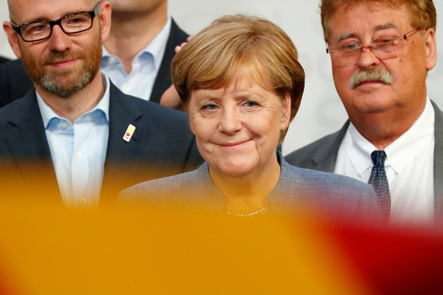 angela merkel wins fourth term as german chancellor