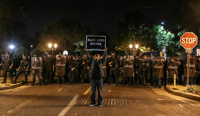 riot police break up st  louis protests over officer s acquittal