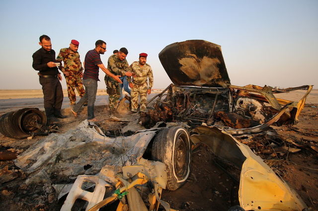 sixty killed in suicide attacks in southern iraq