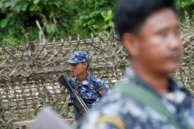 rakhine rebels kill 13 in independence day attack on myanmar police posts