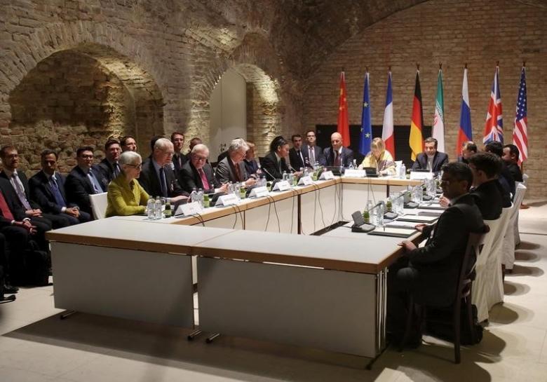 Negotiators of Iran and six world powers face each other at a table in the historic basement of Palais Coburg hotel in Vienna April 24, 2015. Credit: Reuters/Heinz-Peter Bader