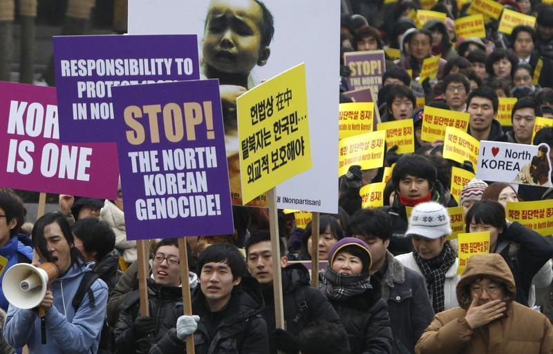 South Korean Christians and former North Korean defectors living in the South march during a rally to protest against what they say is North Korea's violation of human rights, in Seoul January 27, 2012. Credit: Reuters/Kim Hong-Ji