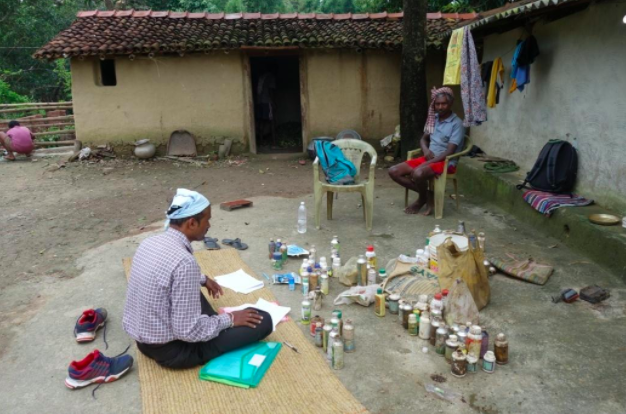 A farmer displays the pesticides he has applied over the past few years. Credit: Joe Hill