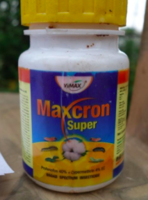 Maxcron Super, approved for use on cotton only, used by a farmer on beans. Credit: Joe Hill