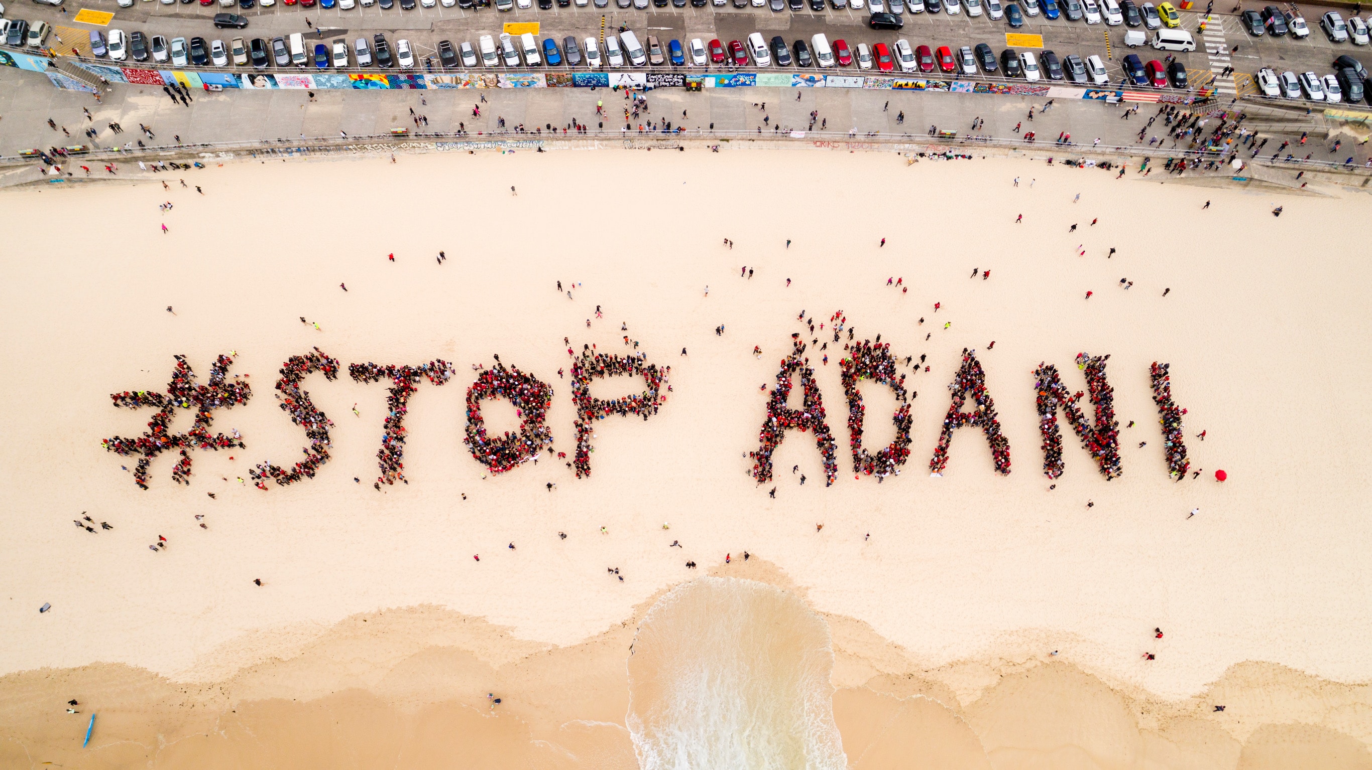 The human formation in Bondi beach in Sydney on October 7. Credit: StopAdaniAlliance.