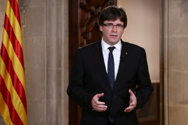 catalan government given eight days by spain to drop independence
