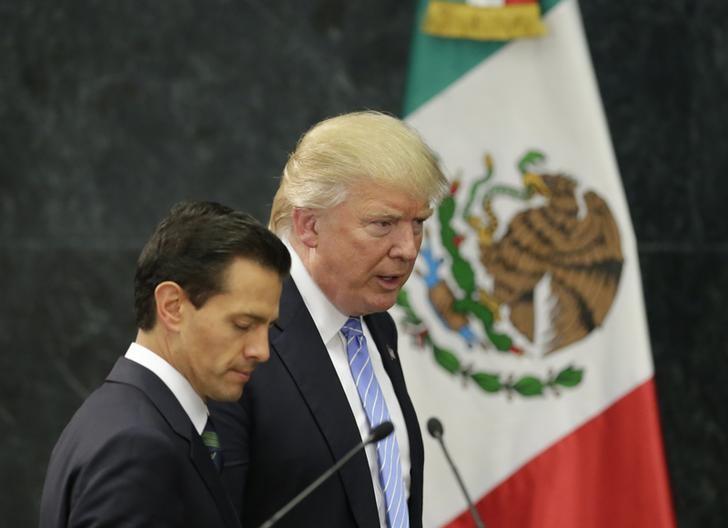 US Republican presidential nominee Donald Trump and Mexico's President Enrique Pena Nieto arrive for a press conference at the Los Pinos residence in Mexico City, Mexico, August 31, 2016. Credit: Reuters/Henry Romero