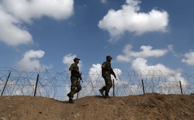 Members of Palestinian security forces loyal to Hamas patrol on the border with Egypt, in Rafah in the southern Gaza Strip October 8, 2017. Credit: Reuters