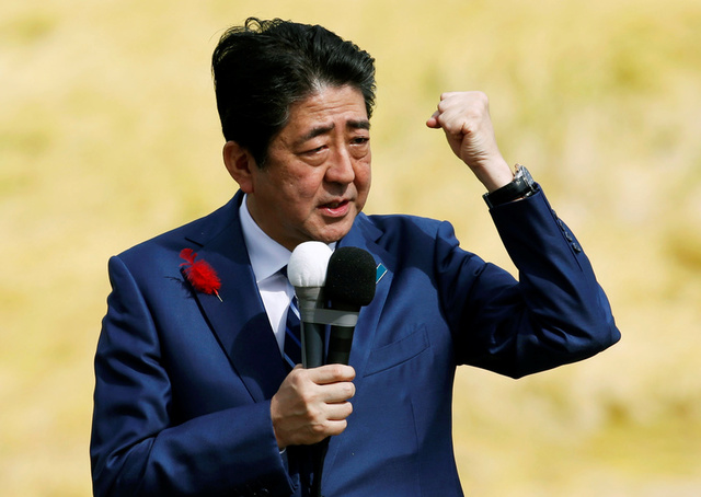 after strong election win  japan s abe to push pacifist constitution reform