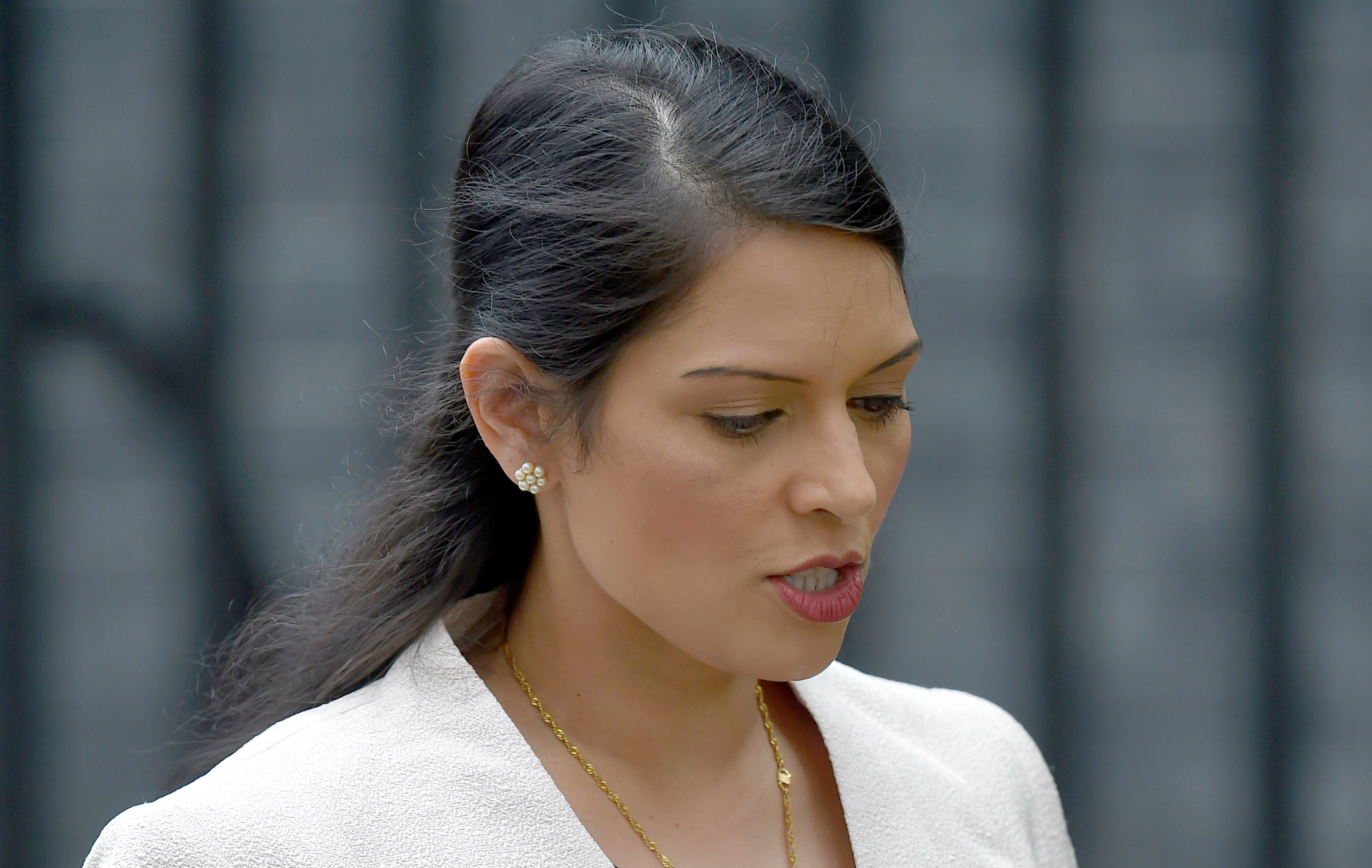 in new test for theresa may  priti patel resigns