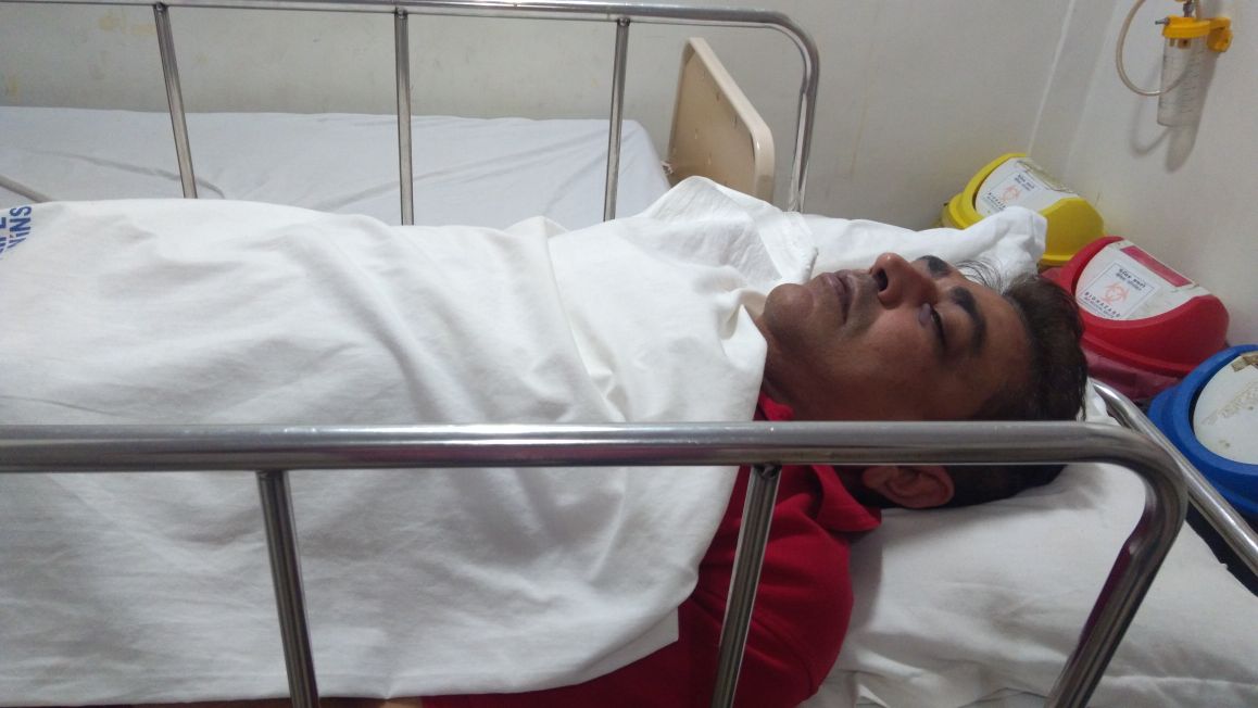 bjp workers allegedly beat up brother of congress candidate contesting against vijay rupani