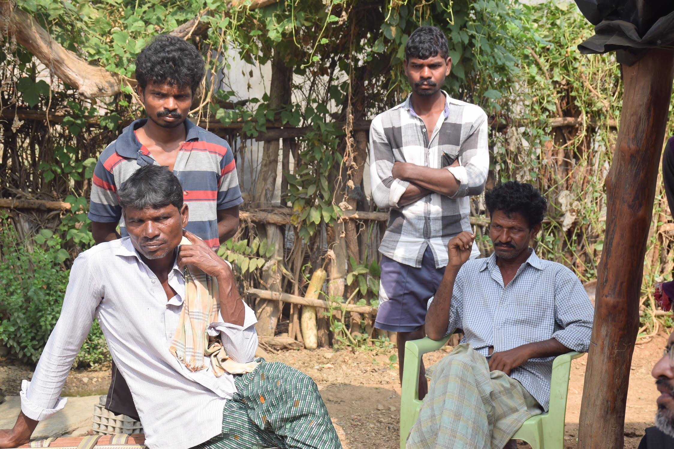 Battu Adinarayana’s brother Narayana (sitting left) at their house in Gattumala village in Bhadradri Kothagudem district in eastern Telangana. Credit: Sukanya Shantha
